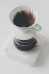 Hario v60 in white ceramic on an Acaia scale