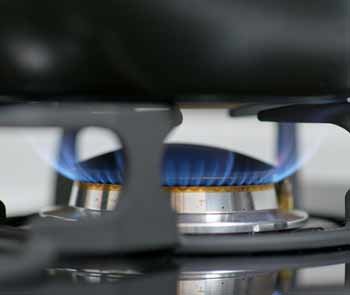 Closeup of a gas flame stovetop